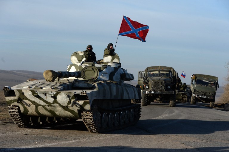 Felkelők Donyeck megyében szerda reggel közlekednek. Fotó: AFP/Vaszilij Maximov