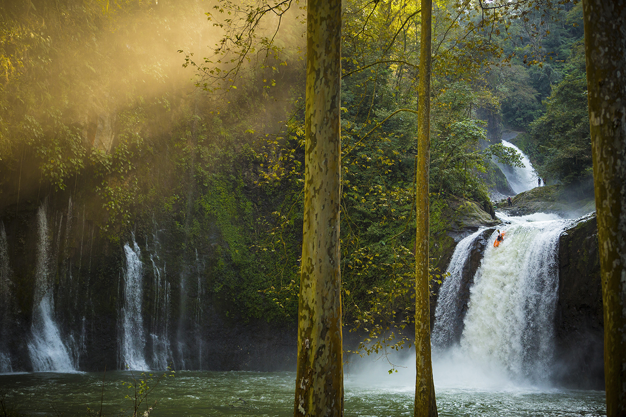 Dane Jackson drops off the edge of a large waterfall during the Red Bull First Descent: Michoacan project, in Tlapacoyan, VE, Mexico, on 4 December, 2013. // John Rathwell / Red Bull Content Pool // P-20140226-00051 // Usage for editorial use only // Please go to www.redbullcontentpool.com for further information. //