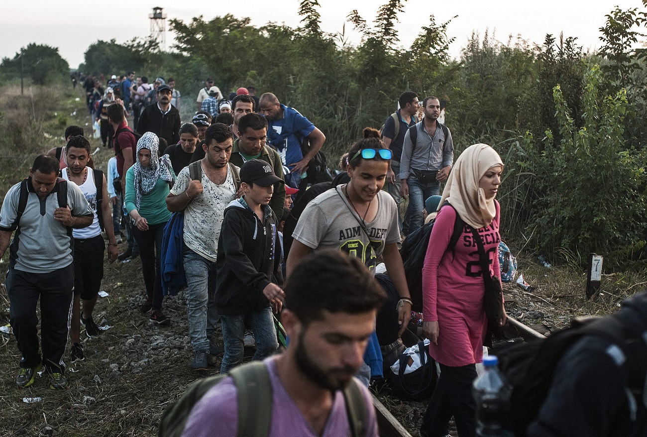 Новости дня мигрантов. Мигранты в Европе. Лагерь беженцев. Экологические беженцы.