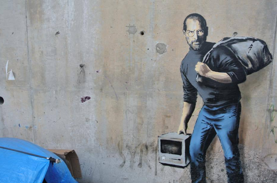 Banksy megfestette a migráns Steve Jobs-t a calais-i menekülttáborban