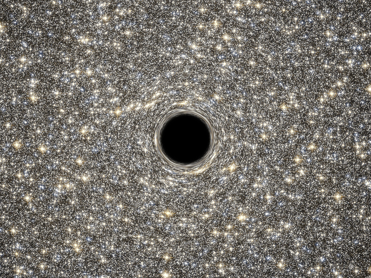 Az ESA/Hubble által 2014-ben kiadott illusztráció azt mutatja, milyen lehet a nagyon sűrű M60-UCD1 galaxis szupermasszív fekete lyuka