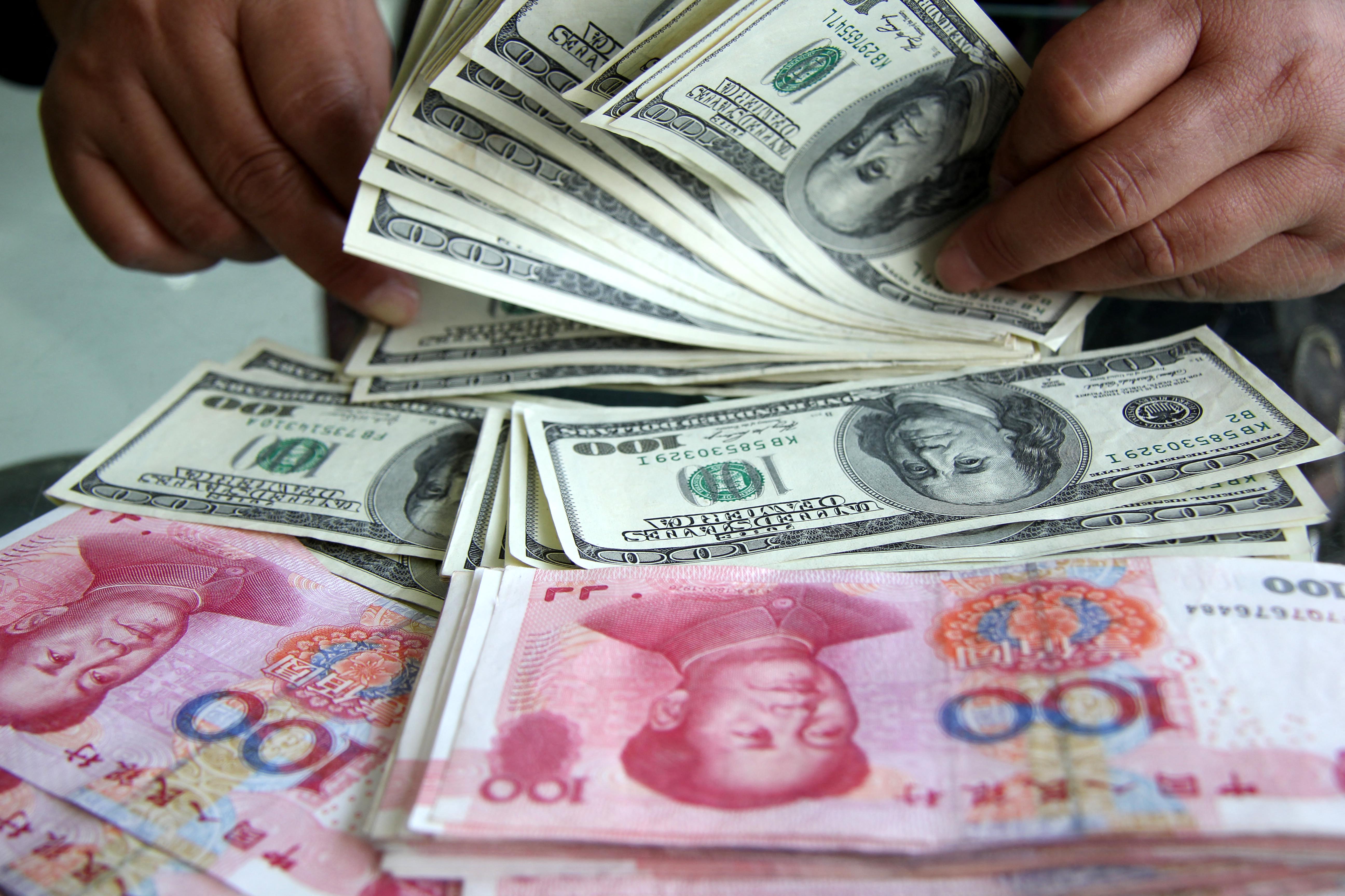 Rekord méretűt eshet idén a jüan árfolyama a dollárhoz képest