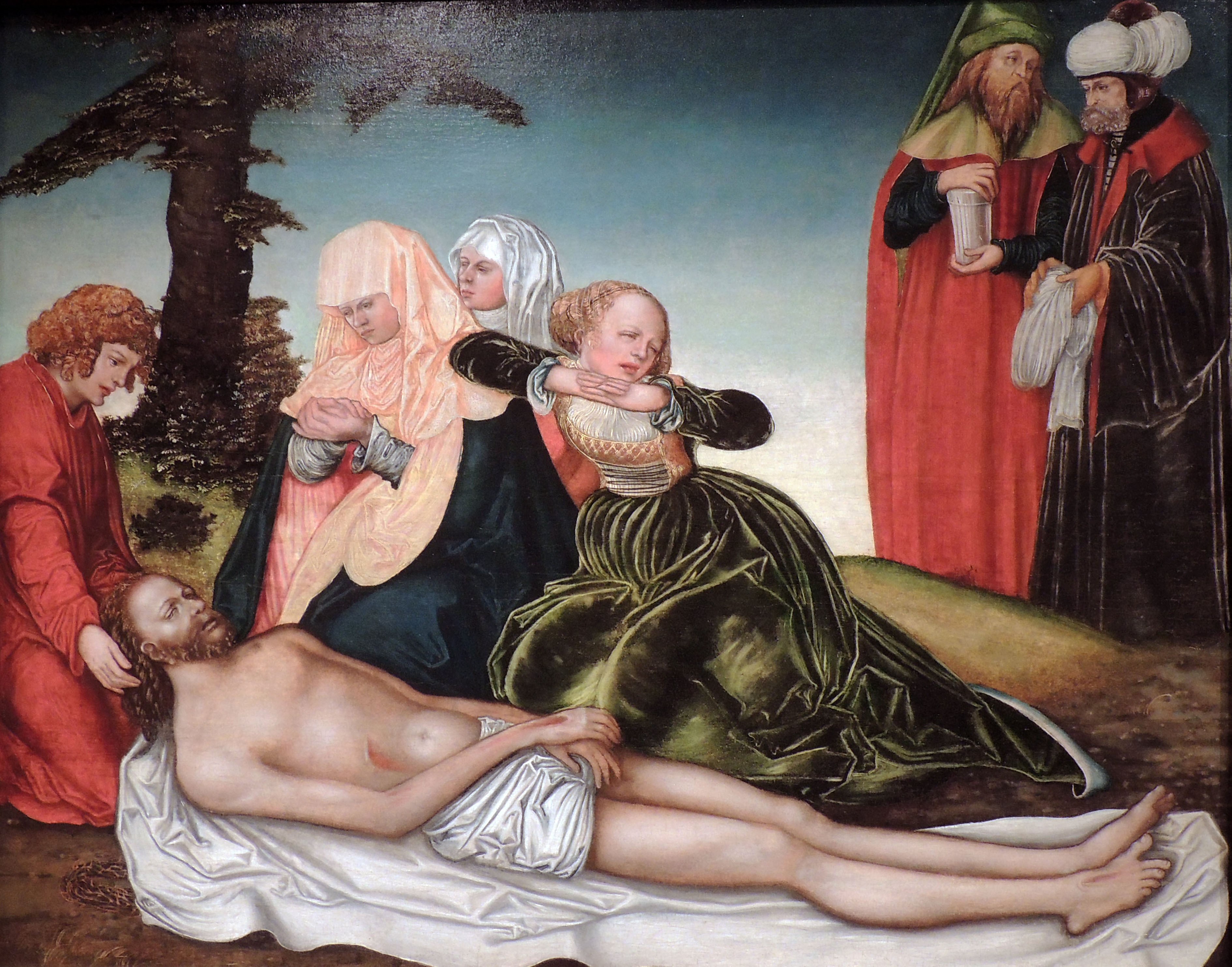 Idősebb Lucas Cranachfestményén (1518) Mária, János apostol és Mária Magdolna siratja Jézust