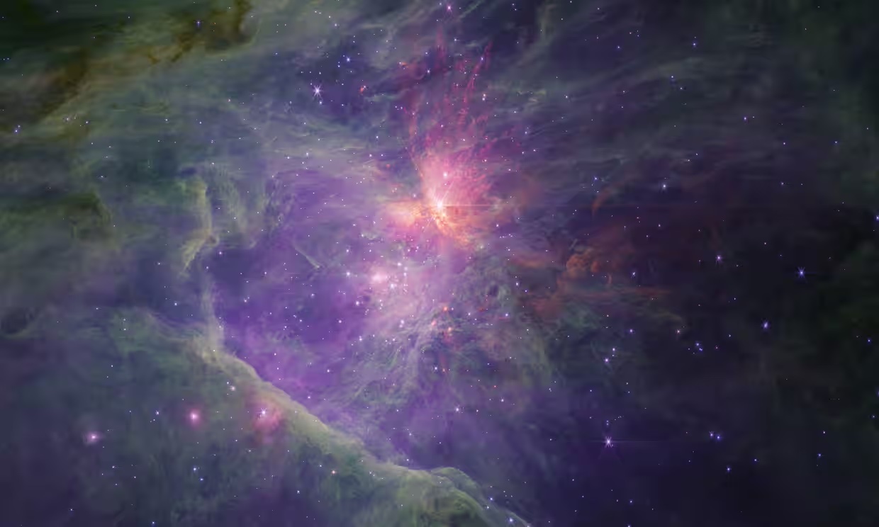 A James Webb űrteleszkóp által a belső Orion-ködről és a Trapézium halmazról készített hosszú hullámhosszú felvétel.