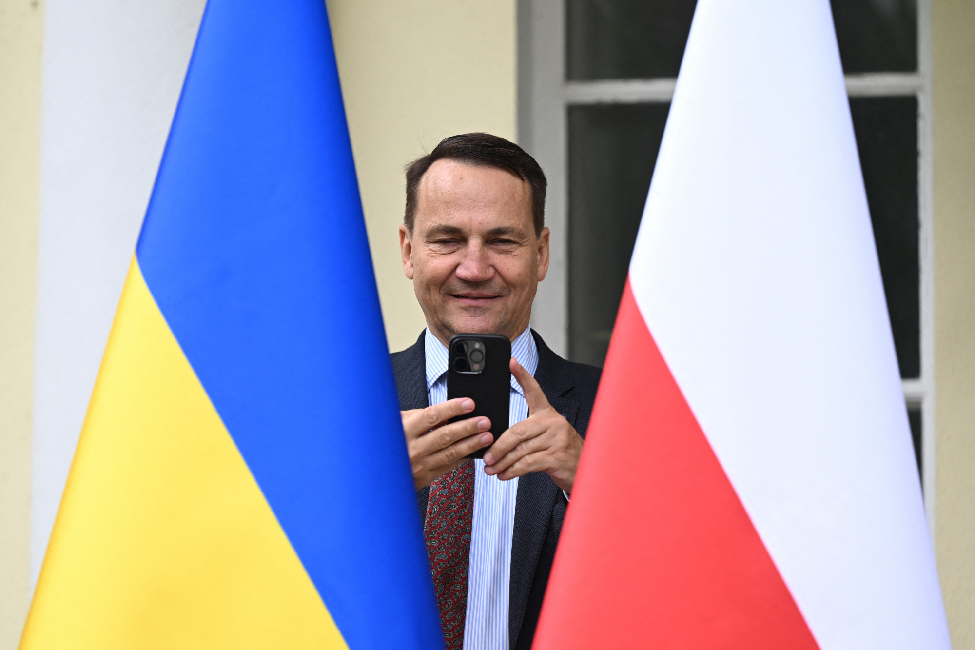 A lengyel külügyminiszter meghívta Lengyelországba a Magyarországról kitiltott „bátor magyart”, Robert Brovdit Kép