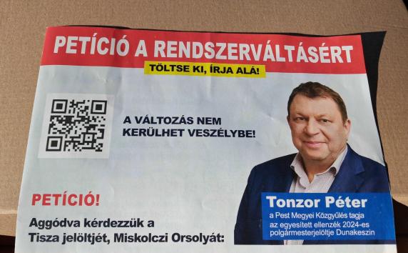 Lejárató kiadványban támadják Tuzson tiszás ellenfelének férjét, de nem a Fidesz, hanem a DK, miközben a papíron ellenzéki párt jelöltje hamisítványnak nevezte a brosúrát